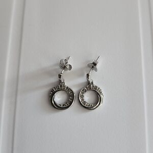 Sterling silver and diamond accent earrings. Never worn